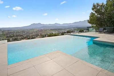 a swimming pool with a view of a city at Restio View 11 in Cape Town