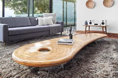 a living room with a couch and a wooden coffee table at Restio View 11 in Cape Town