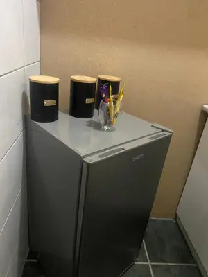 a cabinet with threeools on top of it at Flaming Place in Cape Town