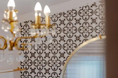 a chandelier in a room with a wall at Blue Bell in Hermanus