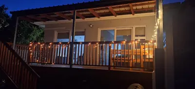 a balcony with christmas lights on a house at 35 Amanda - Durbanville in Cape Town