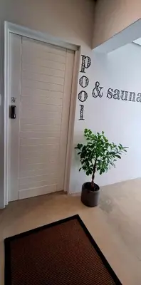 a room with a door and a potted plant at C'est la Vie 3 in Franschhoek