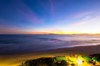 a view of the ocean at sunset at Soete Rus Strand in Cape Town
