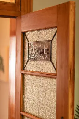a glass door with the name dixonpatrick on it at The View Guesthouse & Cottage in Caledon