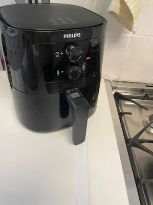 a black pot sitting on a counter next to a stove at Somerset West Family home holiday rental in Cape Town