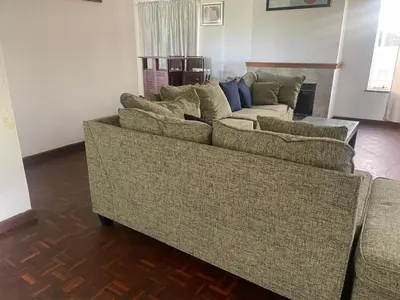 a living room with a couch and two couches at House On Gill 3 in Cape Town