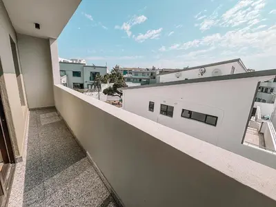 a balcony with a view of a building at Cape Mae Apartment Hotel in Cape Town