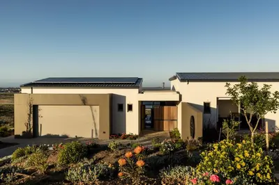 a rendering of a house with a garage at Azure Retreat in Hermanus