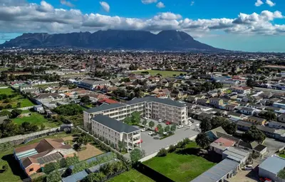 an aerial view of a city with mountains in the background at Camden Stay - Entire Unit - Cape Town in Cape Town