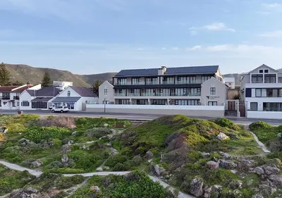 a rendering of a building with a hill in front at 111 at The Esplanade in Hermanus