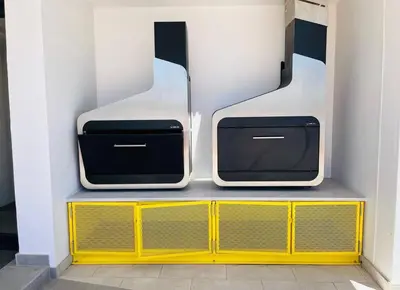 two suitcases sitting on top of a yellow dresser at Seapoint Solace in Cape Town