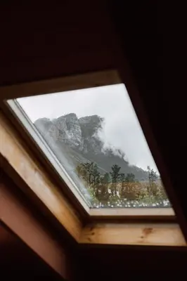 a view of a mountain through a window at No 3 at The Barracks in Stellenbosch
