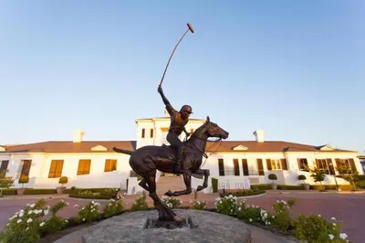 a statue of a man riding a horse with a spear at Luxury Lodge 4F Pearl Valley Golf Estate in Simondium