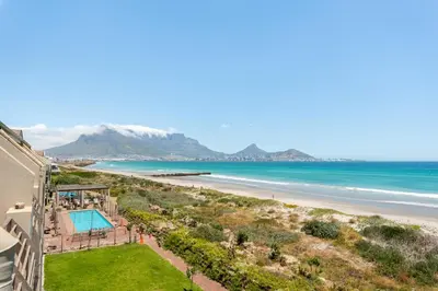 an aerial view of the beach and the ocean at 323 Leisure Bay in Cape Town