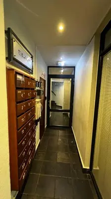a hallway leading to a room with a hallwayasteryasteryasteryasteryasteryasteryastery at Cosy Central Apartment - By ARPA Hospitalities in Stellenbosch