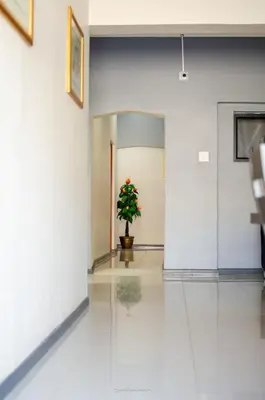 a christmas tree in a hallway in a building at Comfort on Wrench in Cape Town