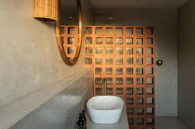 a bathroom with a white sink and a mirror at Spioenkop Wines Farm House in Elgin