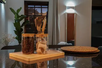 a table with a glass jar filled with food at 7 on Huis Piron in Stellenbosch