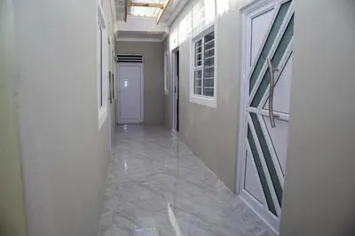 an empty hallway with a door and a hallway sidx sidx sidx at One Bedroom Apartment A4 in Cape Town