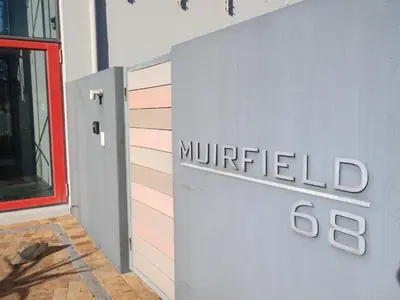 a sign on the side of a building at Misty Mountain in Strand