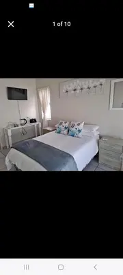 a picture of a bedroom with a large bed at 27 on Milton in Cape Town