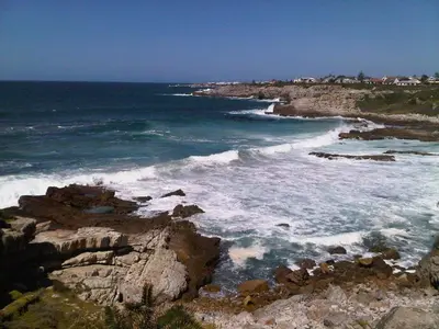 a view of the ocean from a rocky beach at Lifehouse in Hermanus