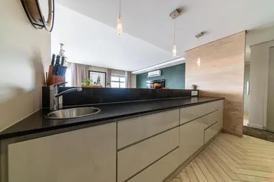 a kitchen with a sink and a counter top at Apartment 206 Andringa Walk in Stellenbosch