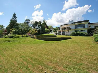 a large yard in front of a house at Tolbos Grand in Somerset West