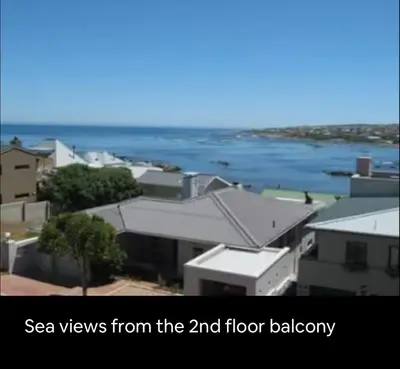 a view ofsea views from the floor balcony at Onrus Beach House in Hermanus
