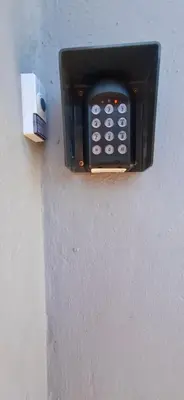 a cell phone is attached to a wall at Grey Vine Cottage - Guest Room in Cape Town
