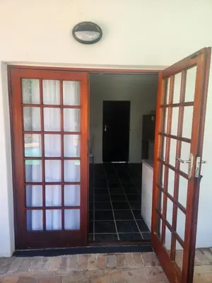 an open door to a room with aoyer with a door at Somerset west Stay 1 in Somerset West