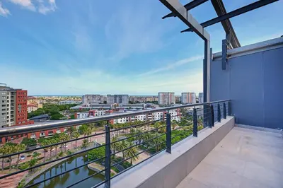 a balcony with a view of a city at Ultra Luxury 3 Bed Knightsbridge Penthouse in Cape Town