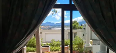 a view from the window of a house at Arendsnest Self Catering in Gordonʼs Bay