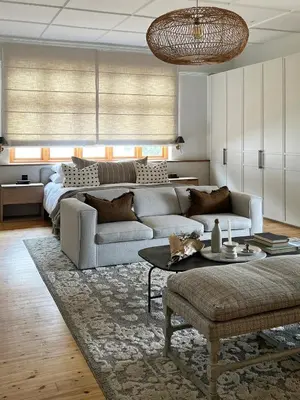 a living room with a couch and a table at Hermanus Seafront Villa - Sophie's Rock in Hermanus