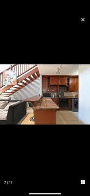 a kitchen with a staircase leading to a living room at YA Eagle Wings Self Catering Shared Single Room Lodge A in Cape Town