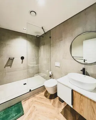 a bathroom with a toilet and a sink and a shower at Grace On Park by Dajosha in Cape Town