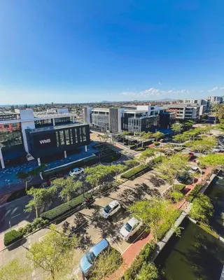 an aerial view of a city with a parking lot at Shalom on Matrix by Dajosha in Cape Town