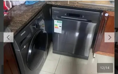 a stainless steel dishwasher in a kitchen next to a counter at YA Eagle Wings Self Catering Shared Single Room Lodge A in Cape Town