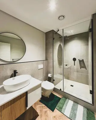 a bathroom with a toilet and a sink and a shower at Peace On Park by Dajosha booking in Cape Town