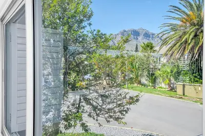 a view from a window of a driveway at Self-Catering Winelands Views Apartment Stellenbosch in Stellenbosch