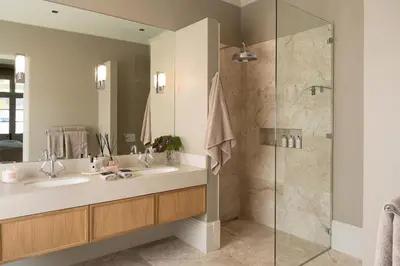a bathroom with two sinks and a shower at Pink Door Franschhoek by The Oyster Collection in Franschhoek
