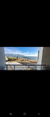 a view of the ocean from a building at 210 at Beach in Strand