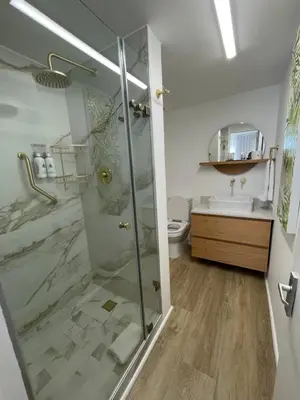 a bathroom with a shower and a sink at Gordonia Unit 9 Gordons Bay in Gordonʼs Bay