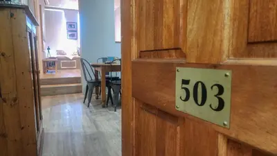 a door with the number on it in a living room at The Botanic High Gold in Paarl