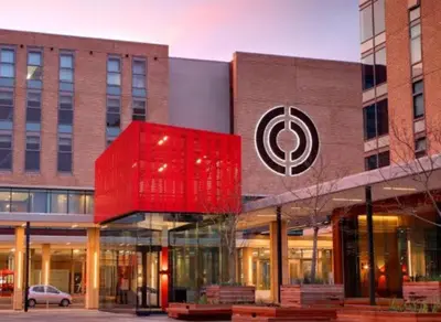 a building with a red object on top of it at Luxe at Nine Palms Near Canal Walk in Cape Town