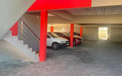 a garage with two cars parked in it at JM B&B - Mandalay in Mandalay