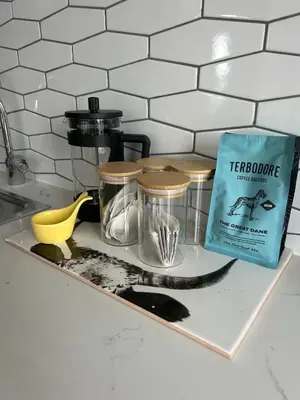 a kitchen counter with a tray with some utensils at 16Park in Stikland