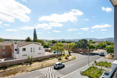 a view of a street in a residential neighborhood at Breeze of the Sea Apartment in Cape Town