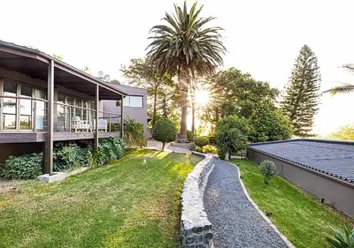 a house with a garden and a house at Von Wyn Berg in Stellenbosch