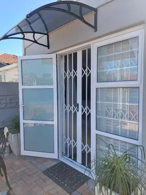 an open door to a house with a patio at Cosy Nook in Cape Town
